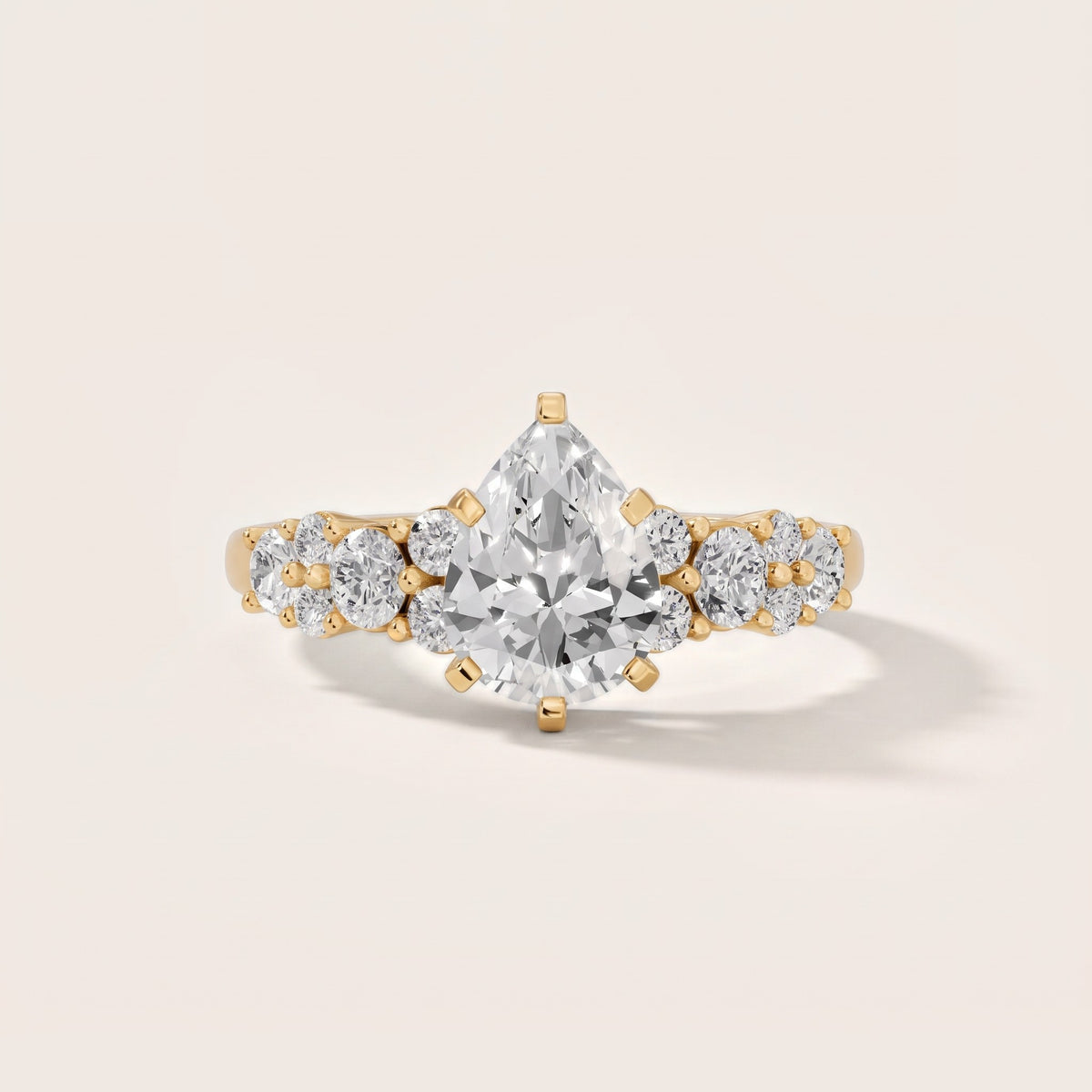 Roxana Graduated Cluster Pear Diamond Engagement Ring in Yellow Gold - front.jpg