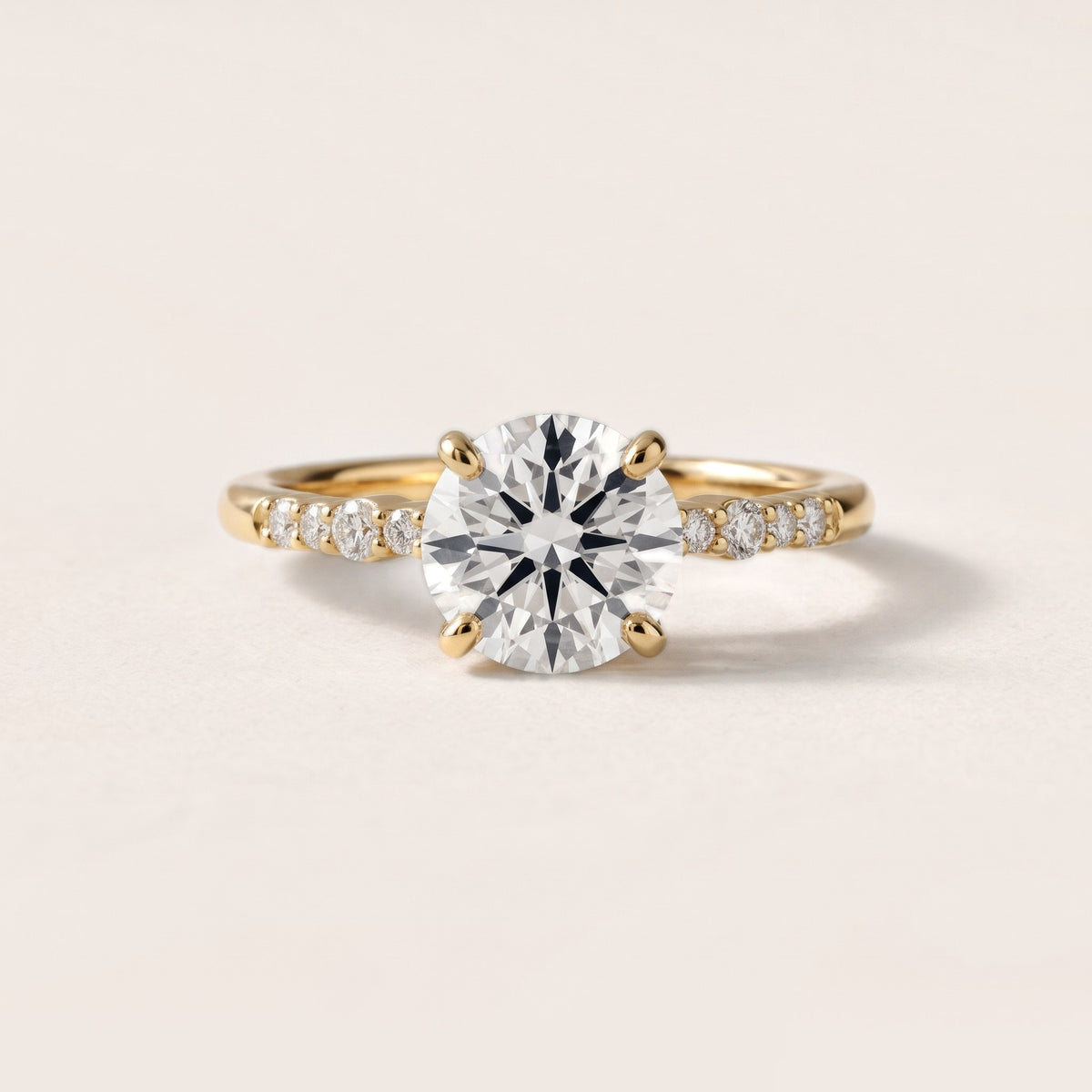 Deirdre Graduated Pavé Round Diamond Engagement Ring in Yellow Gold - front.jpg