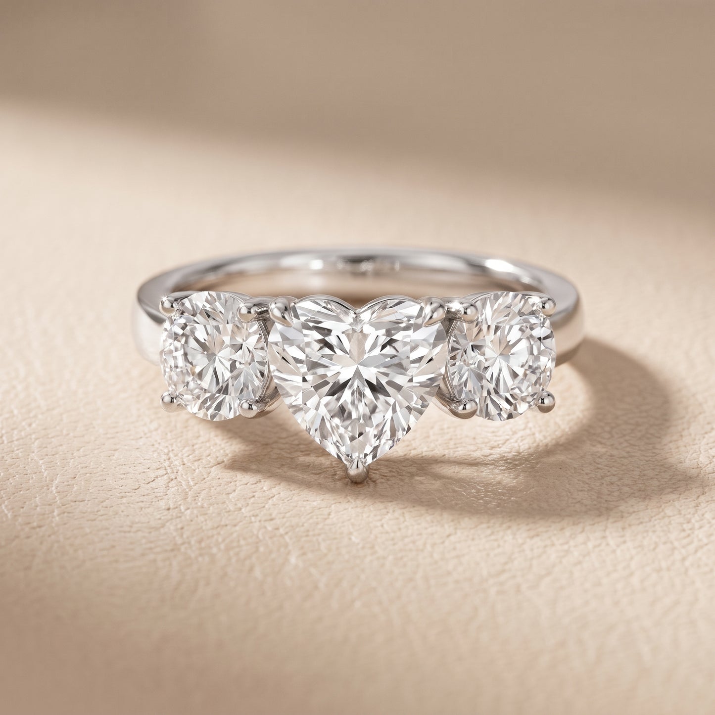 Esme Three-Stone Tapered Heart Diamond Ring in Platinum - front.jpg