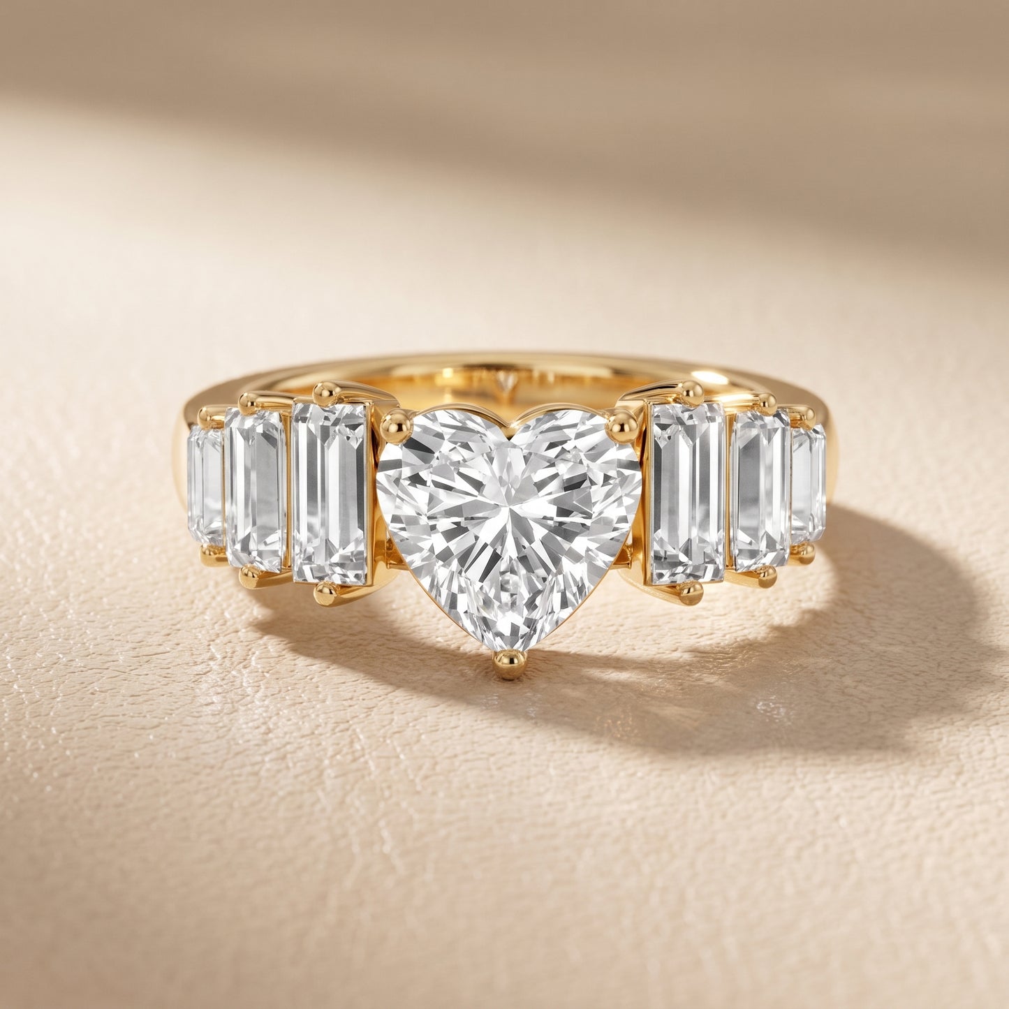 Mara Sidestone Baguette Accent Heart Diamond Engagement Ring in Yellow Gold - front.jpg