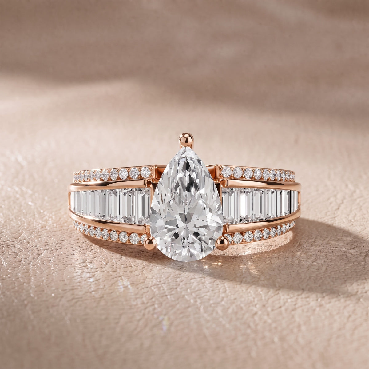Tara Channel Set Baguette Accent Pear Diamond Engagement Ring in Rose Gold - front.jpg
