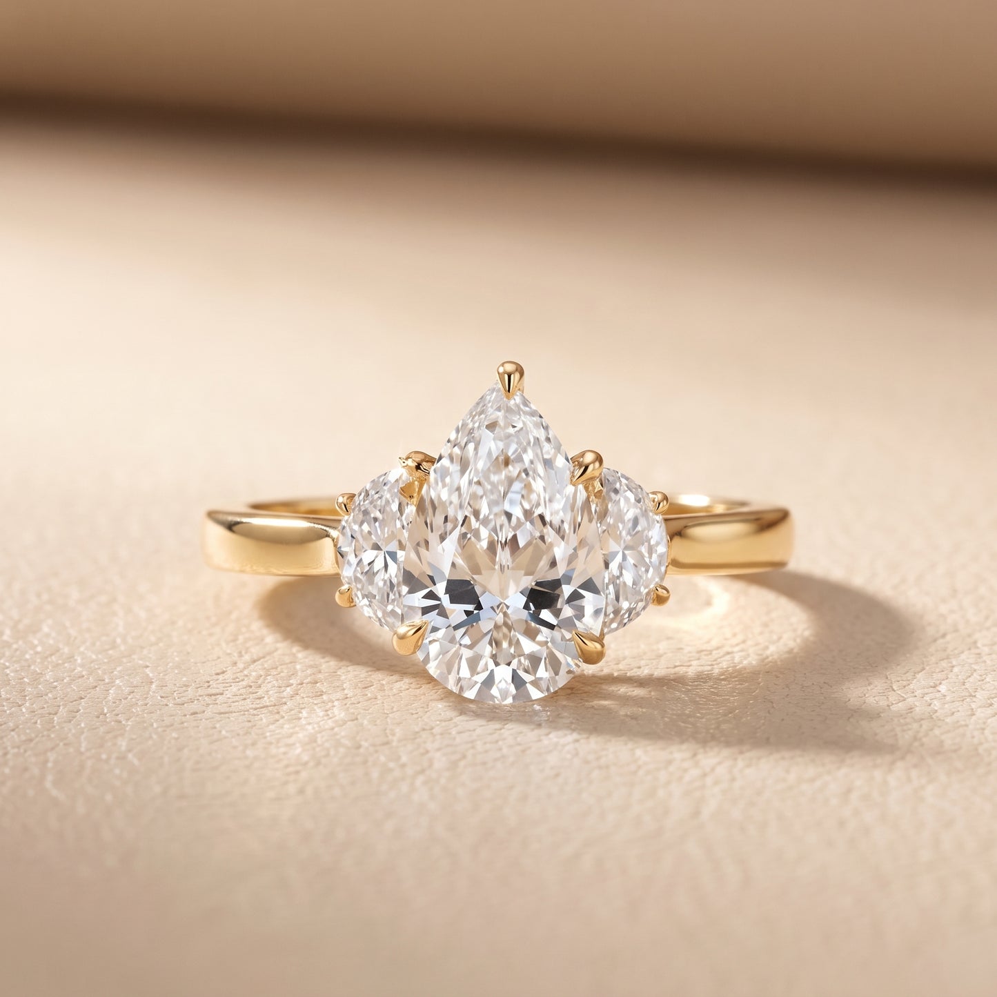 Romy Three-Stone Pear Diamond Engagement Ring in Yellow Gold - front.jpg