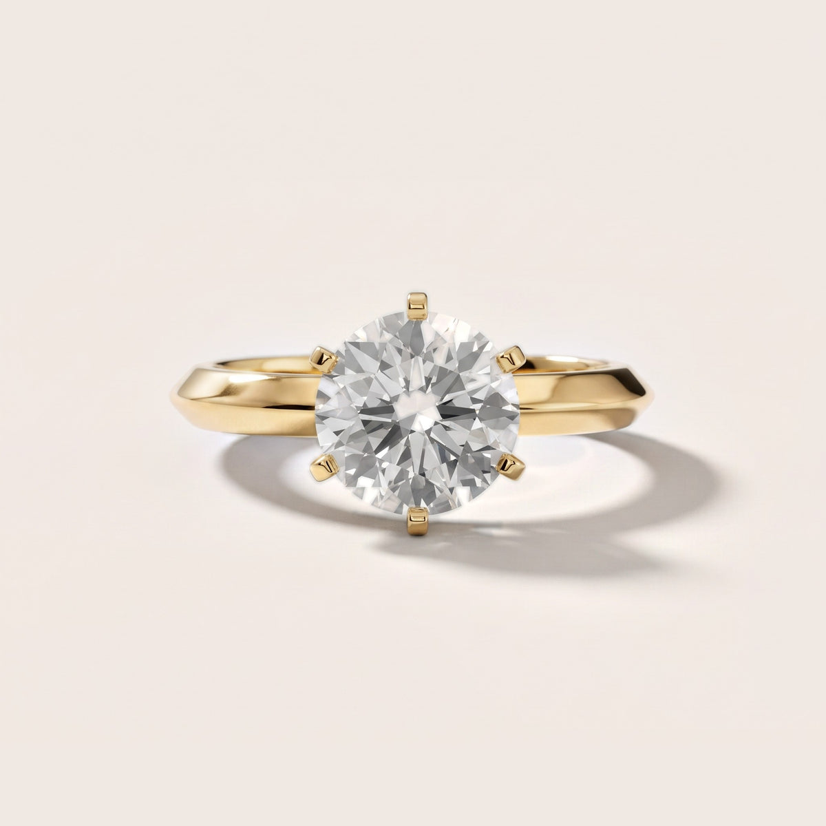Hailey Solitaire Knife Edge Round Diamond Engagement Ring in Yellow Gold - front.jpg