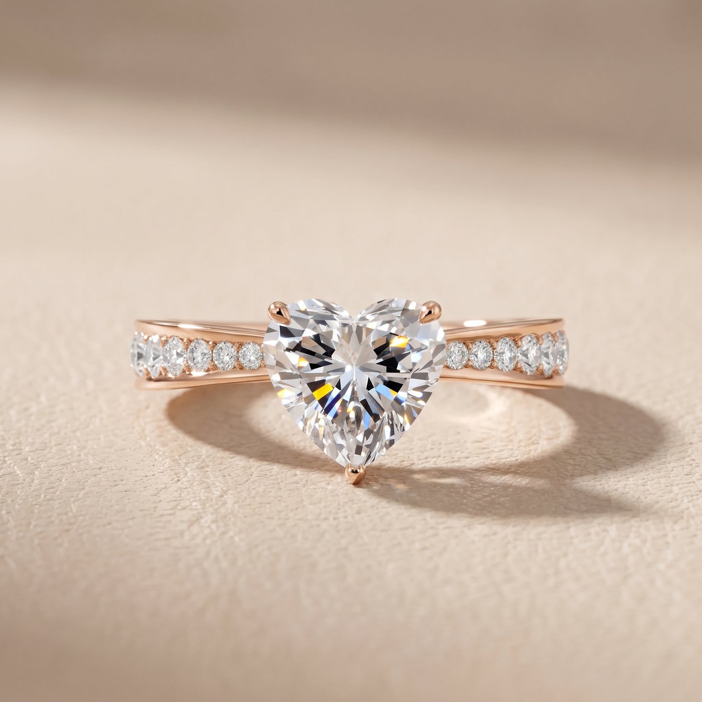 Rhea Sidestone Pavé Heart Diamond Engagement Ring in Rose Gold - front.jpg