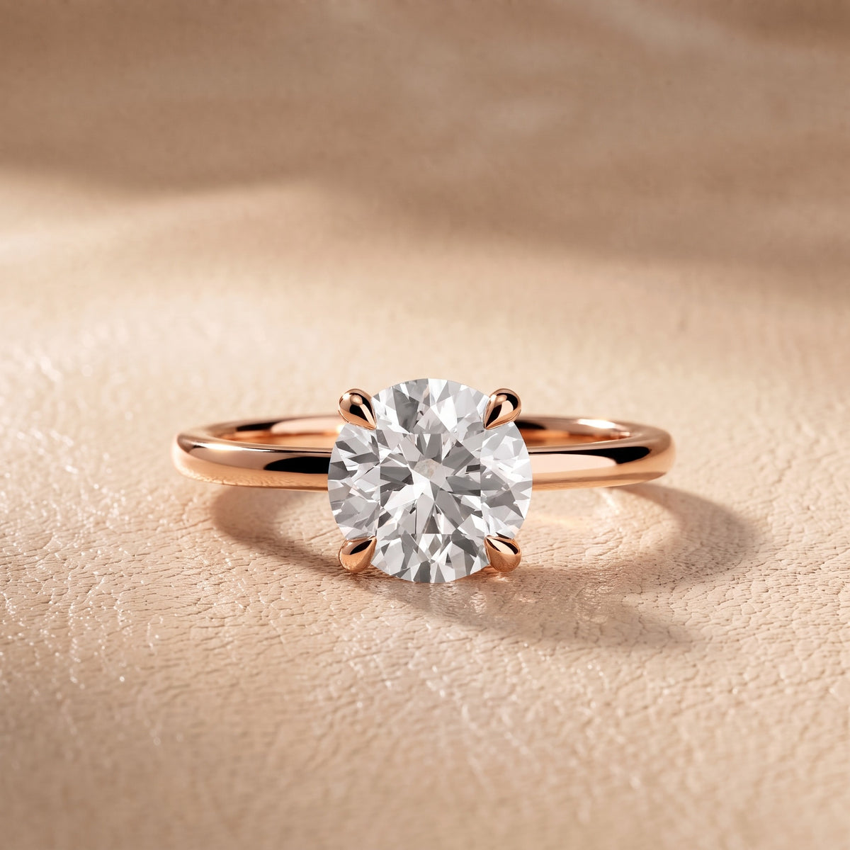 Nella Petite Solitaire Round Diamond Engagement Ring in Rose Gold - front.jpg