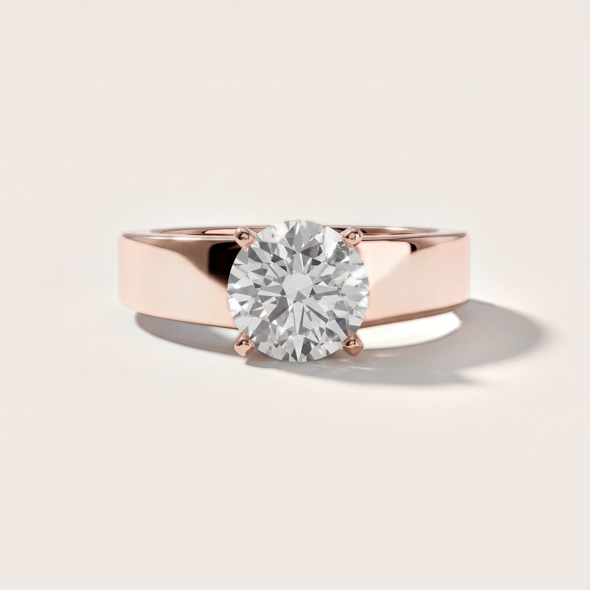 Susannah Wide Band Solitaire Round Diamond Engagement Ring in Rose Gold - front.jpg