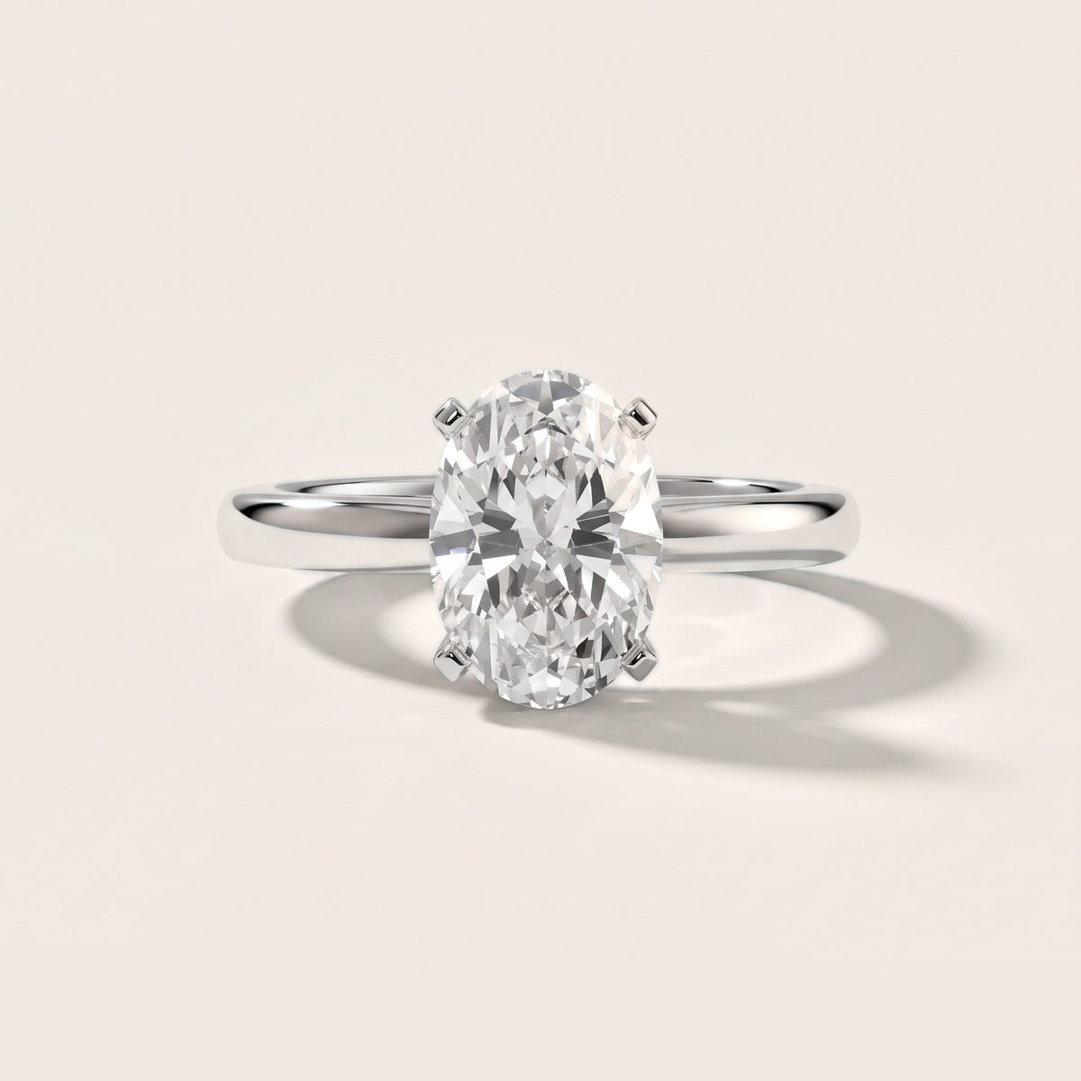 Tamsin Solitaire Knife Edge Oval Diamond Engagement Ring in White Gold - front.jpg