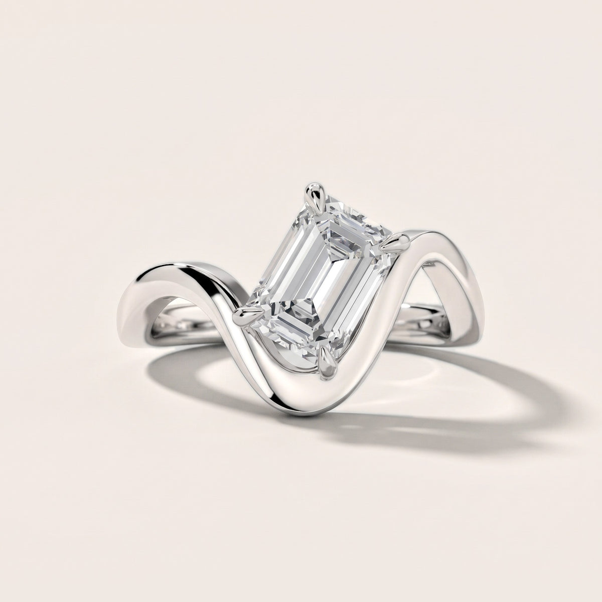 Empire Solitaire Bypass Emerald Diamond Engagement Ring in Platinum - front.jpg