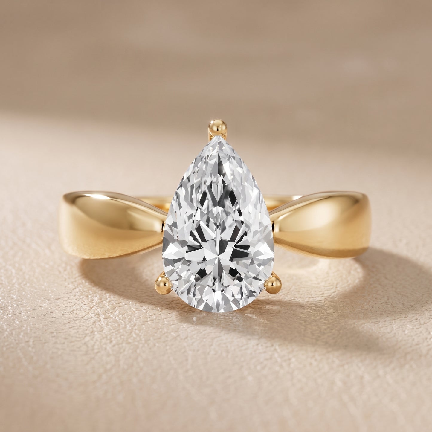 Talia Solitaire Twist Pear Diamond Engagement Ring in Yellow Gold - front.jpg