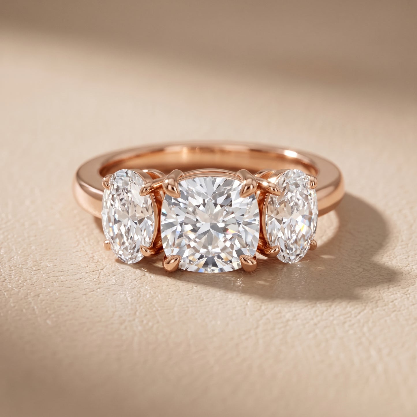Lila Three-Stone Cushion Diamond Ring in Rose Gold - front.jpg