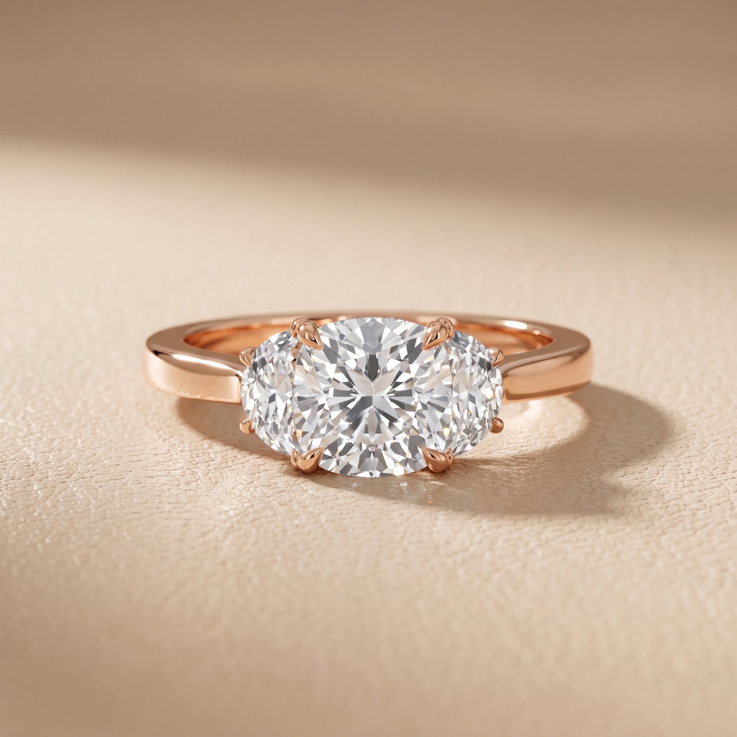 Romy Three-Stone Cushion Diamond Engagement Ring in Rose Gold - front.jpg