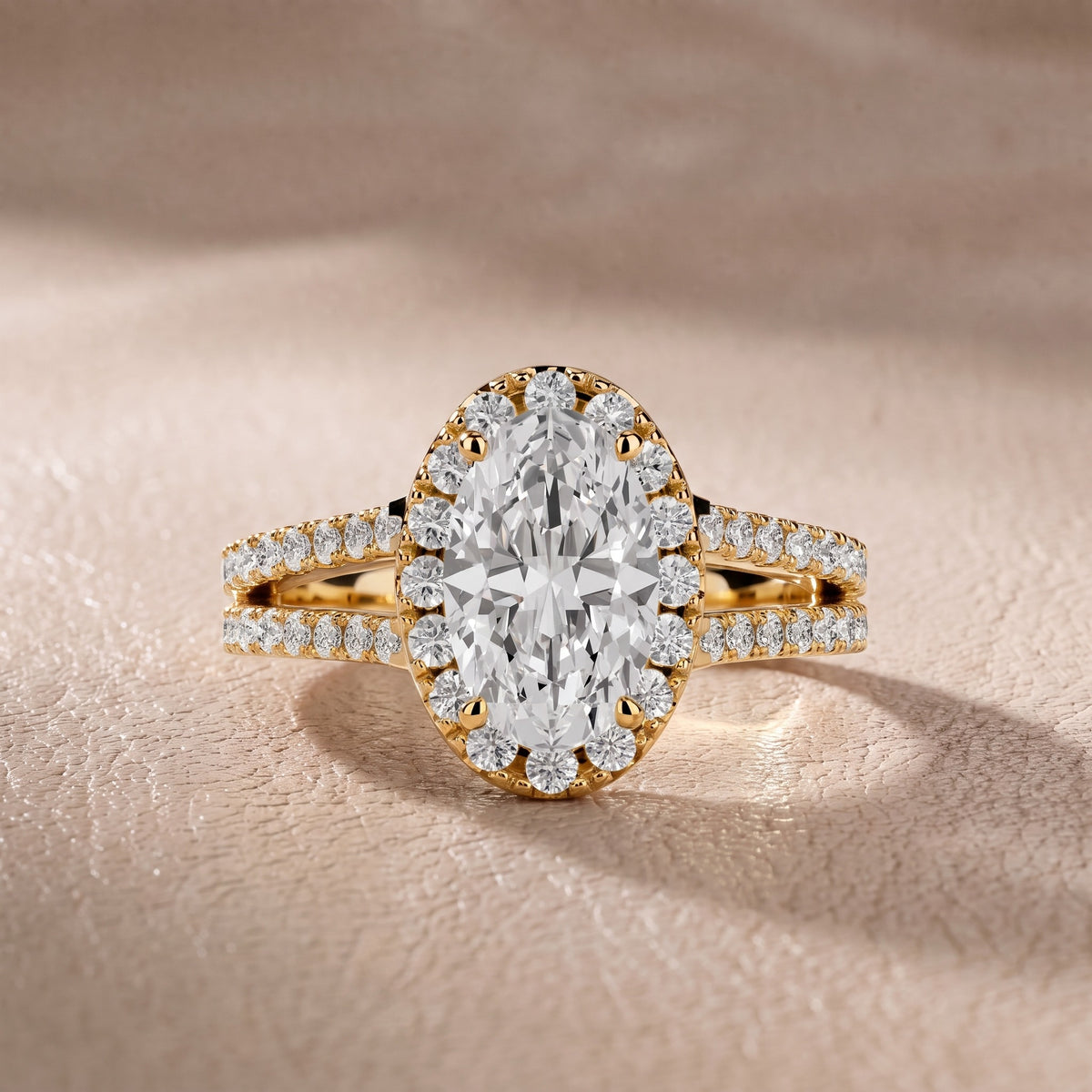 Kira Halo Split Shank Oval Diamond Engagement Ring in Yellow Gold - front.jpg