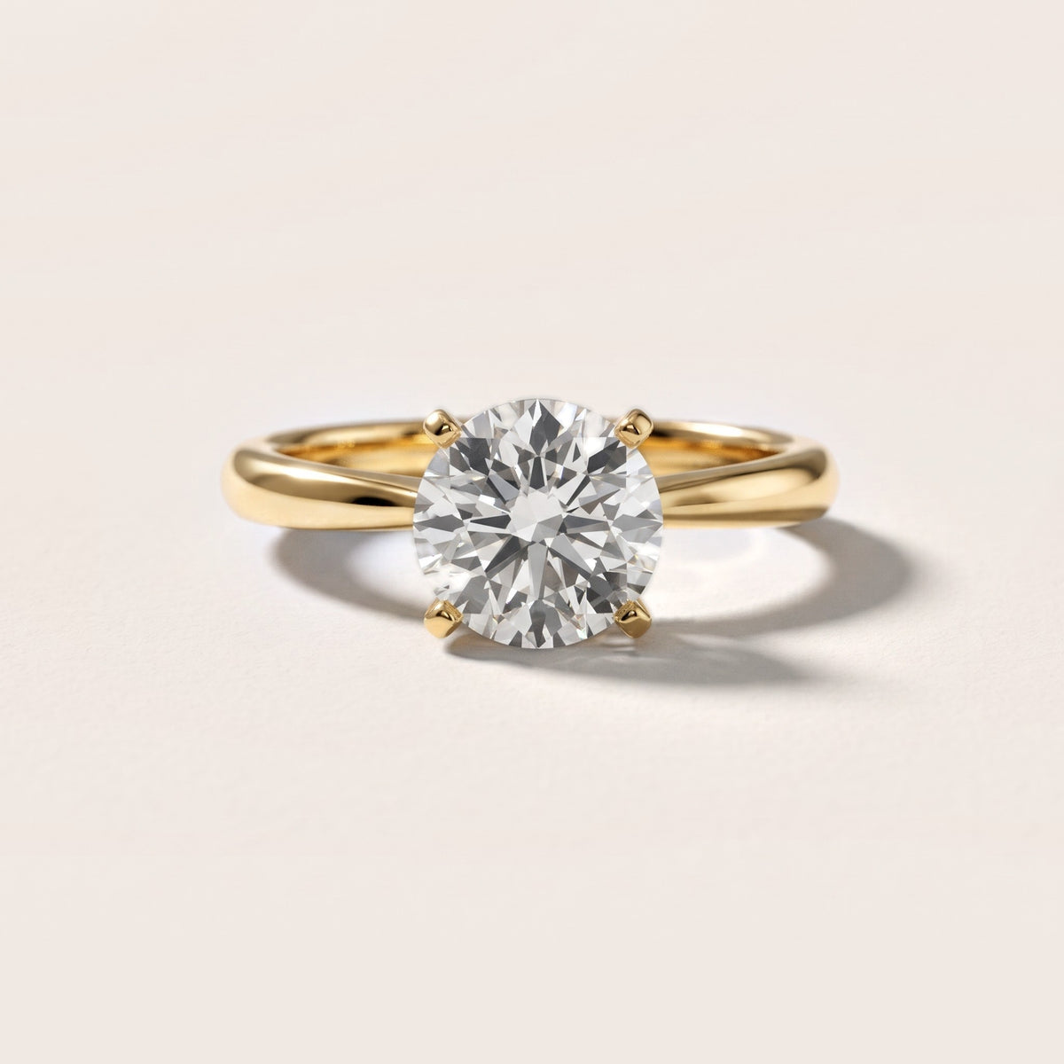 Arlette Solitaire Knife Edge Round Diamond Engagement Ring in Yellow Gold - front.jpg
