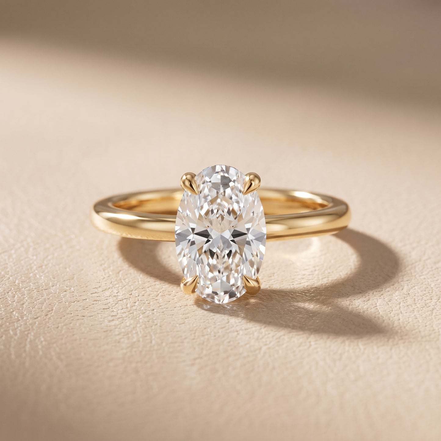 Nella Petite Solitaire Oval Diamond Engagement Ring in Yellow Gold - front.jpg