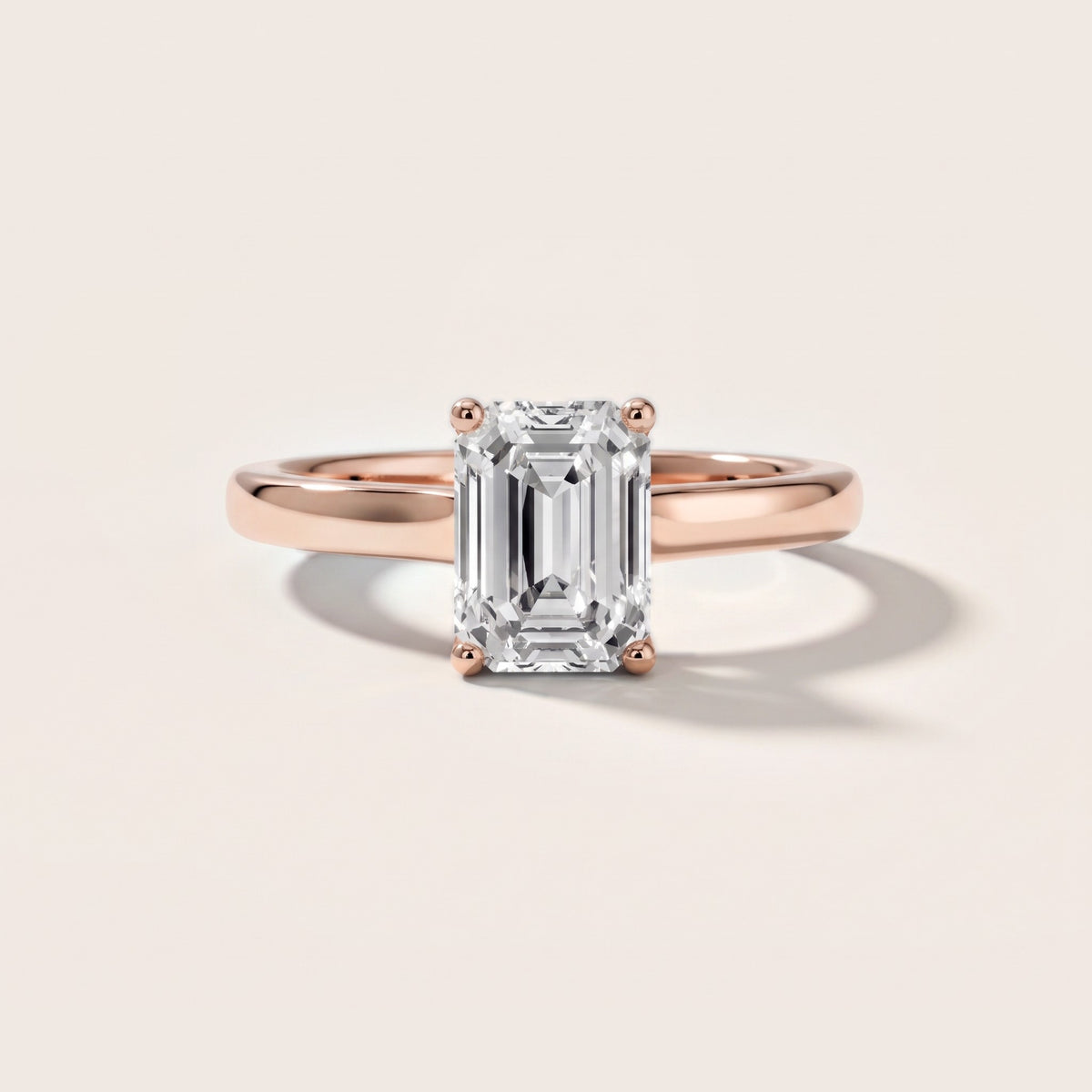 Emeline Solitaire Cathedral Emerald Diamond Engagement Ring in Rose Gold - front.jpg