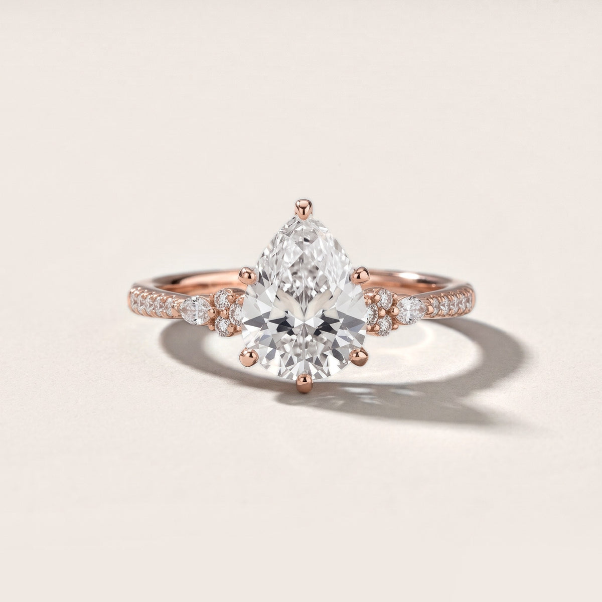 Reina Pavé Cluster Pear Diamond Engagement Ring in Rose Gold - front.jpg