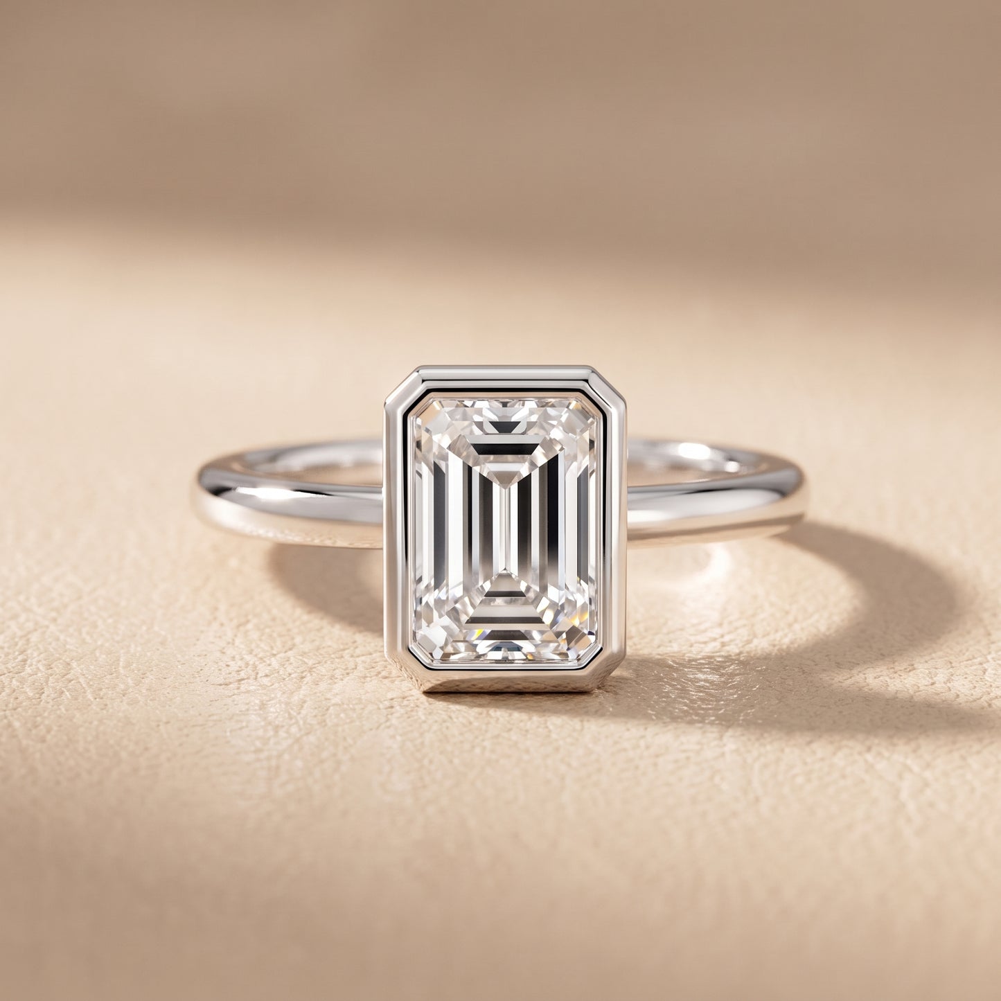 Maeve Bezel Solitaire Emerald Diamond Ring in White Gold - front.jpg
