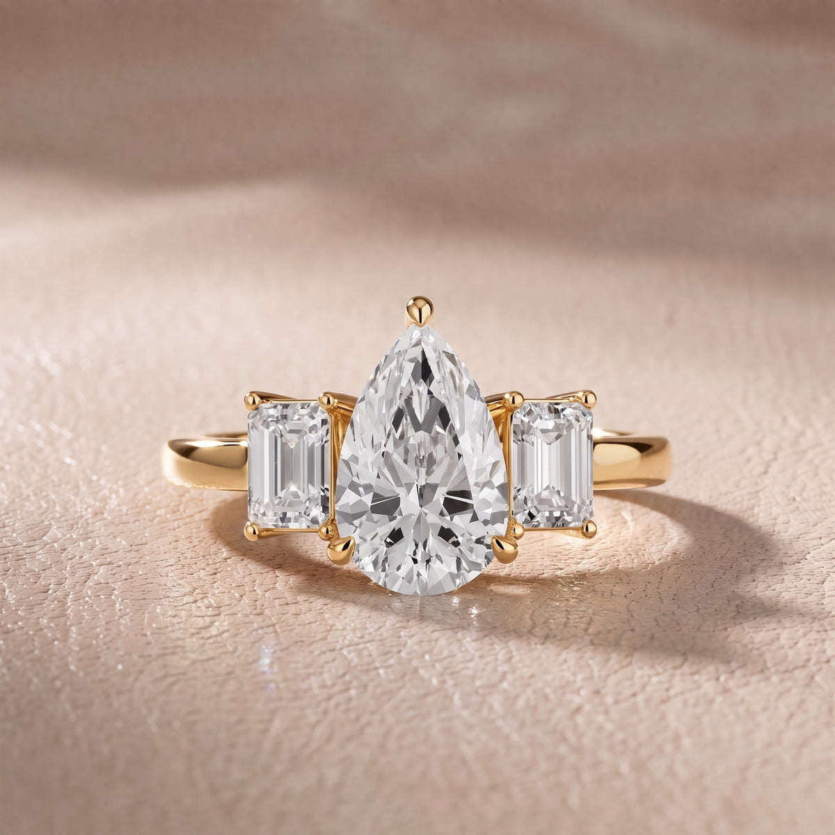 Zoe Three-Stone Pear Diamond Engagement Ring in Yellow Gold - front.jpg