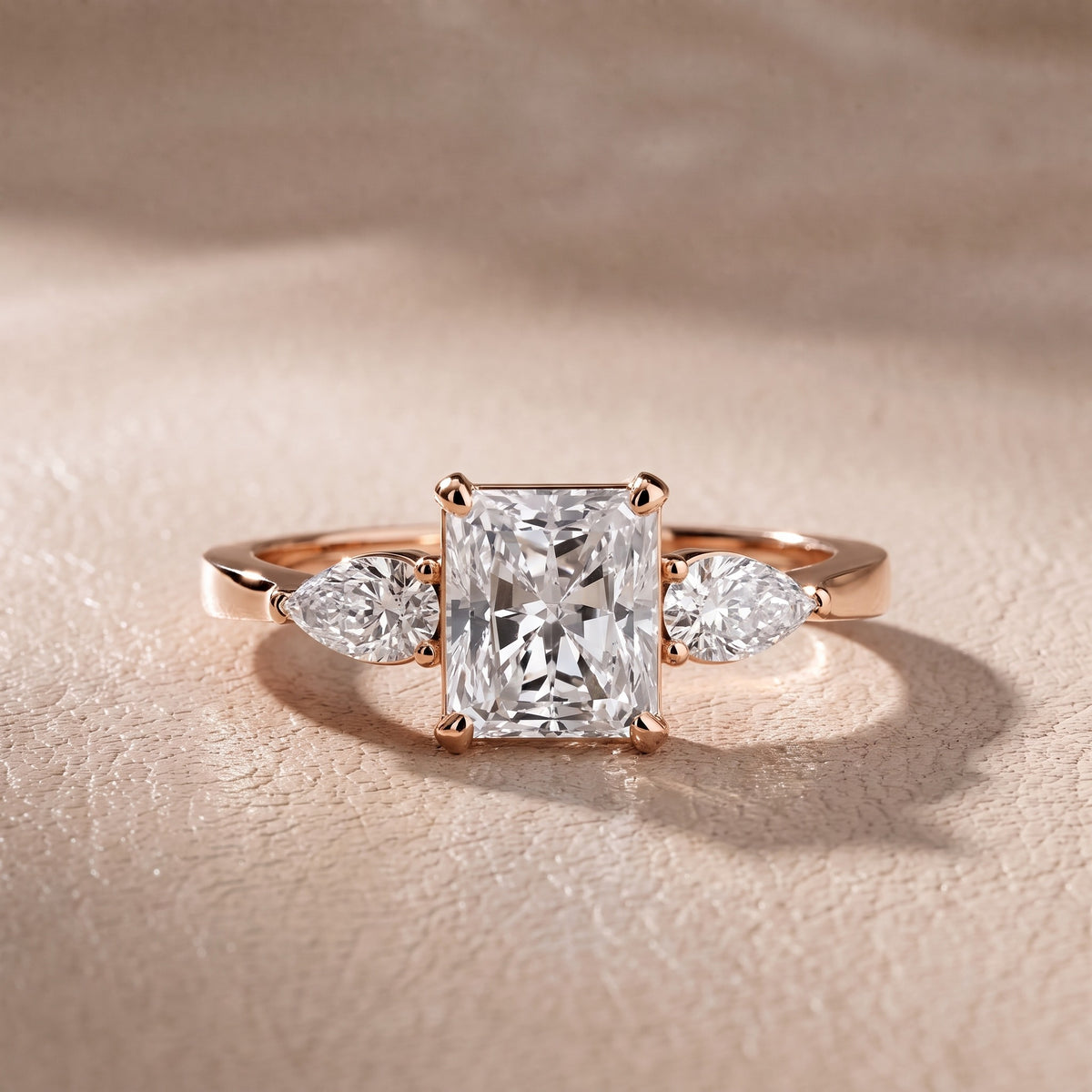 Grace Three Stone Radiant Diamond Engagement Ring in Rose Gold - front.jpg