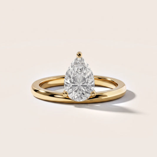 Maisie Four Prong Solitaire Pear Diamond Engagement Ring in Yellow Gold