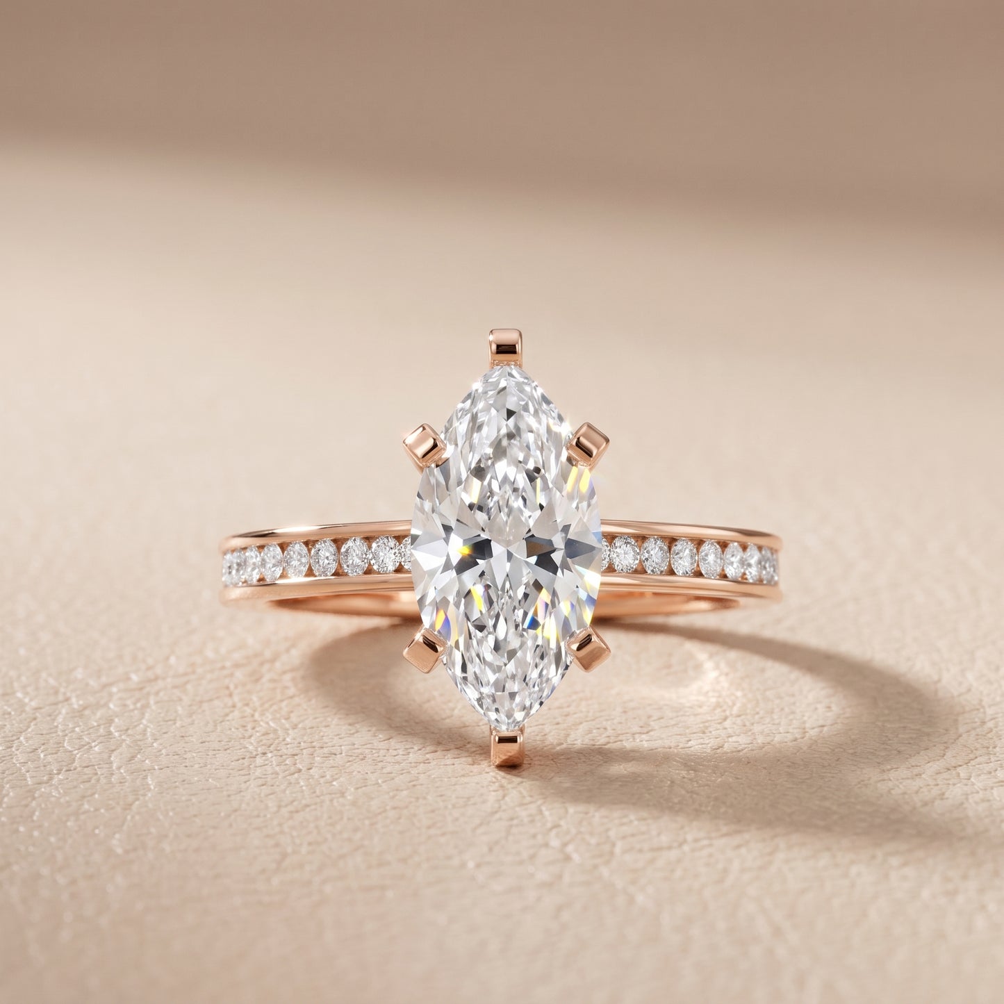 Tessa Solitaire Channel Set Marquise Diamond Engagement Ring in Rose Gold - front.jpg