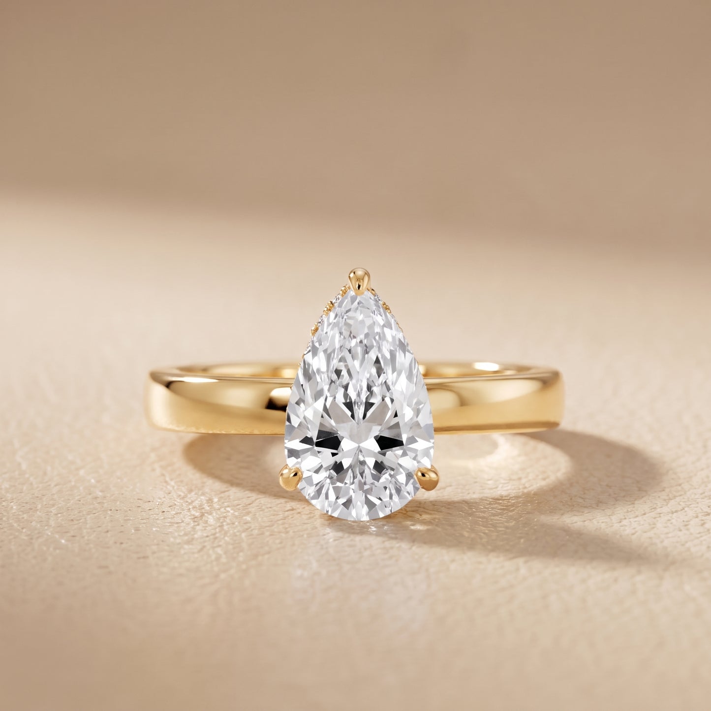 Lara Hidden Halo Pear Diamond Engagement Ring in Yellow Gold - front.jpg