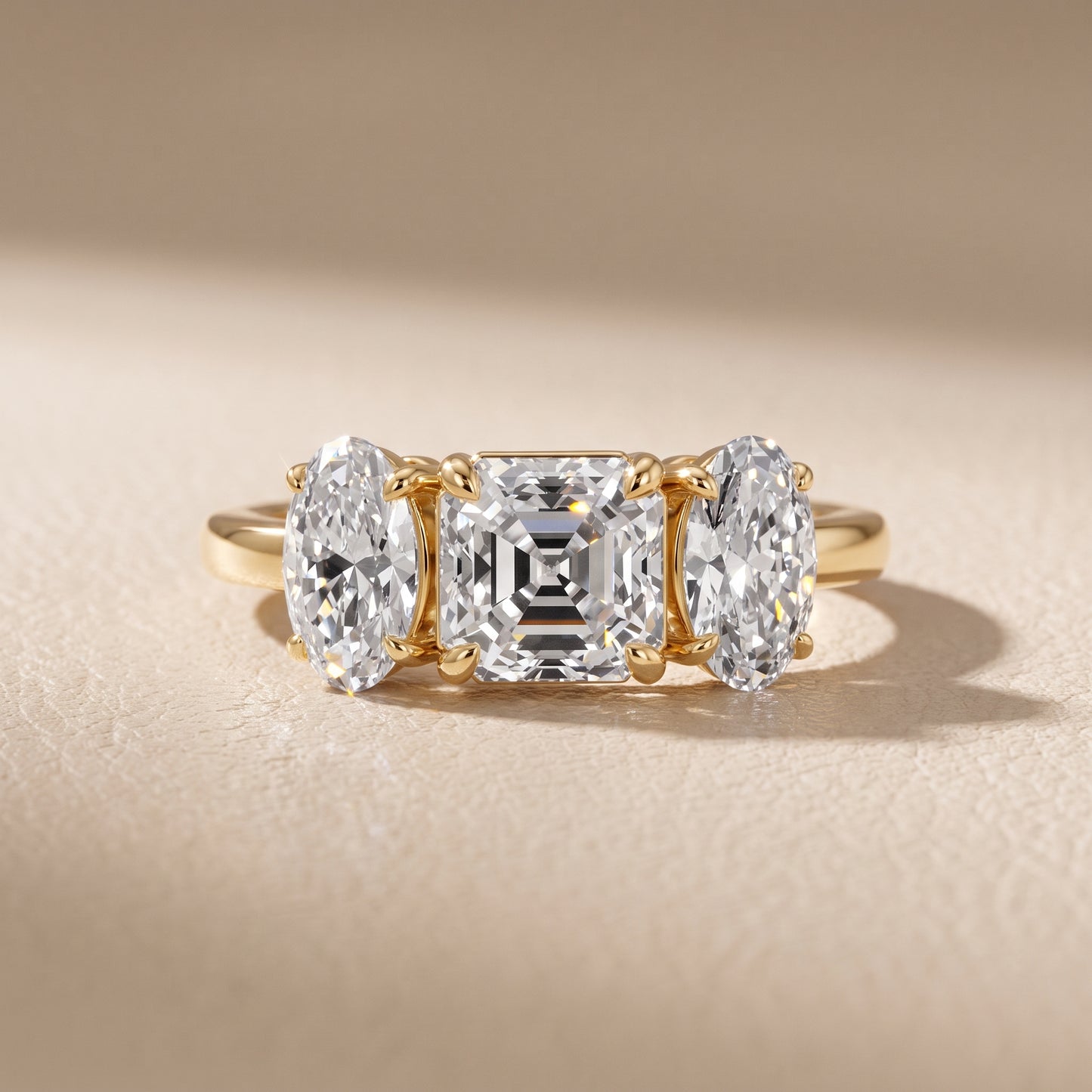 Lila Three-Stone Asscher Diamond Ring in Yellow Gold - front.jpg