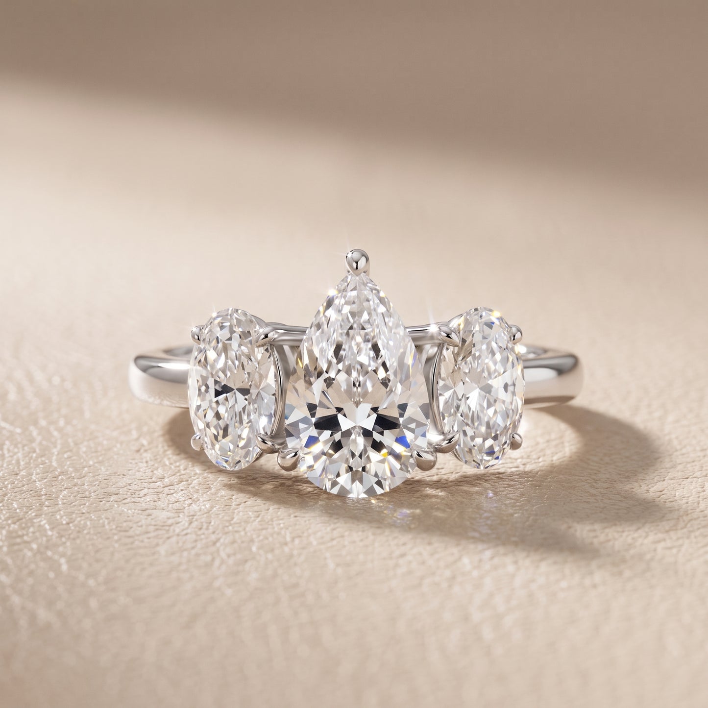 Lila Three-Stone Pear Diamond Ring in White Gold - front.jpg