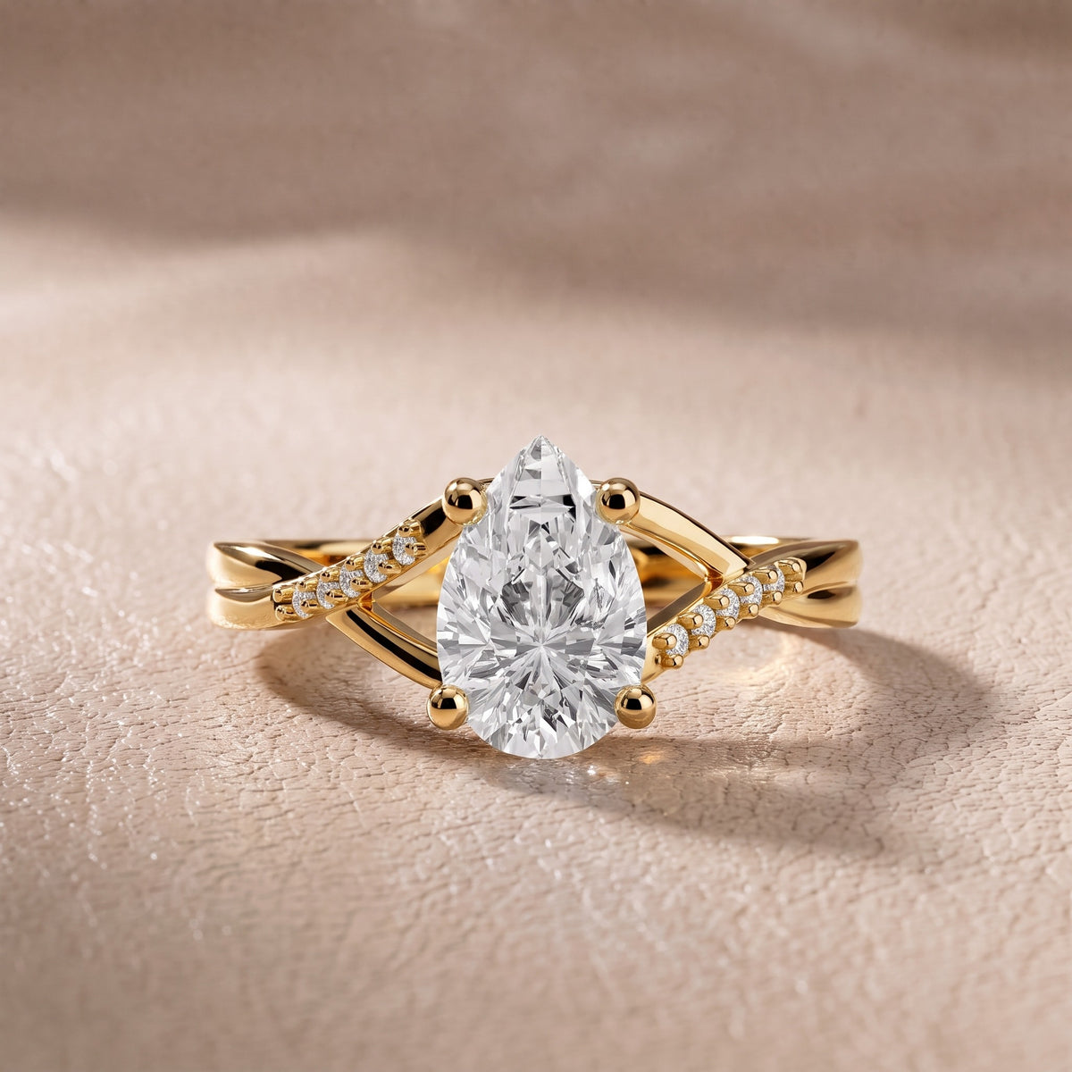 Veronica Twist Side Stone Pear Diamond Engagement Ring in Yellow Gold - front.jpg