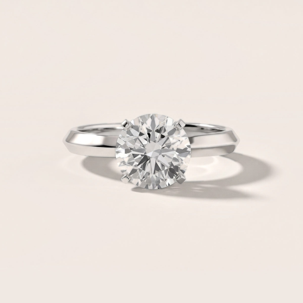 June Solitaire Knife Edge Round Diamond Engagement Ring in Platinum - front.jpg