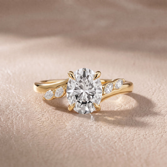Flora Twist Side Stone Oval Diamond Engagement Ring in Yellow Gold - front.jpg