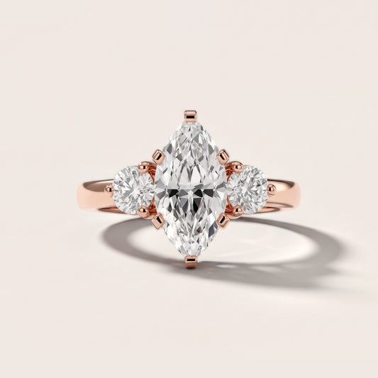 Freesia Three-Stone Marquise Diamond Engagement Ring in Rose Gold