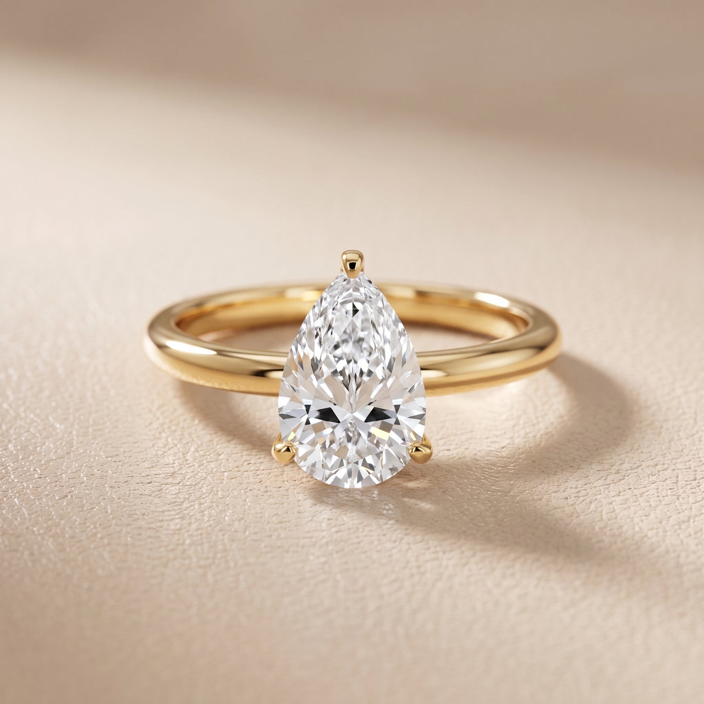 Wren Solitaire Pear Diamond Ring in Yellow Gold - front.jpg