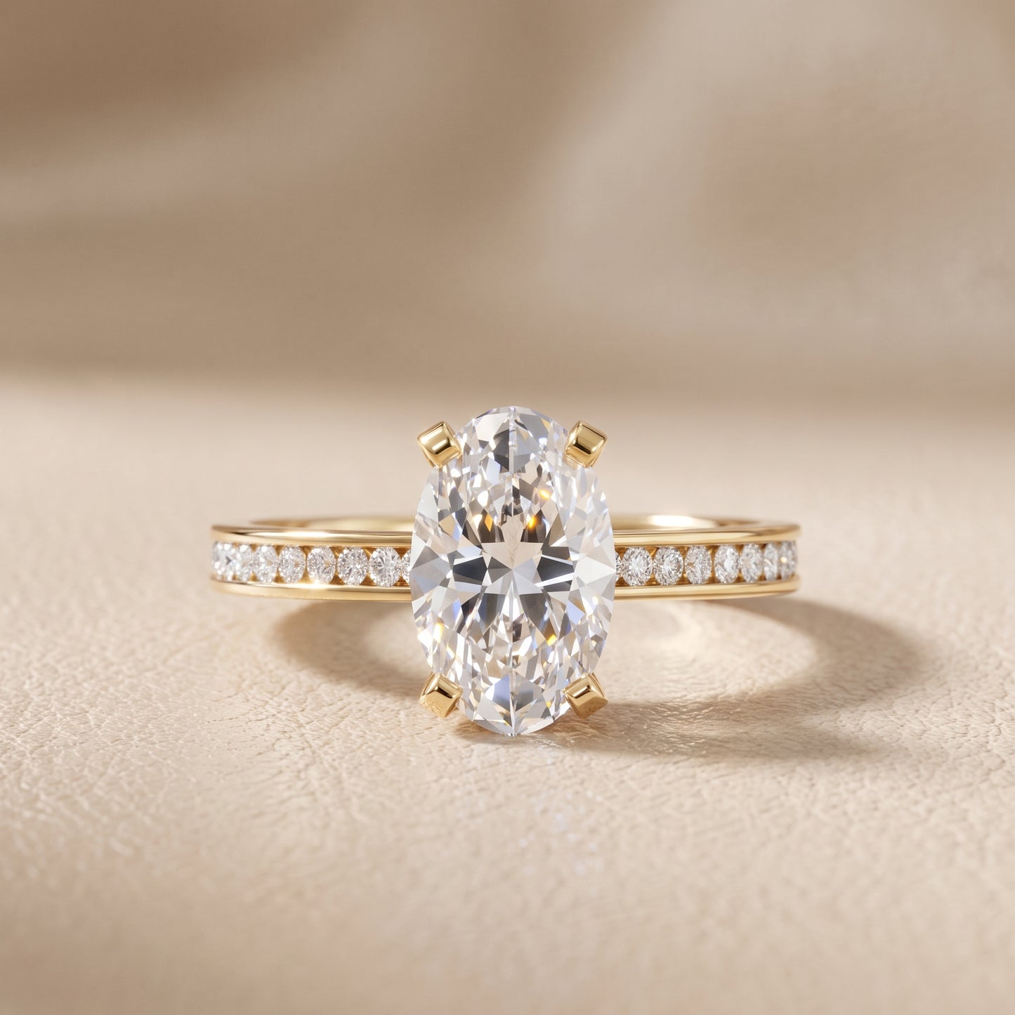 Tessa Solitaire Channel Set Oval Diamond Engagement Ring in Yellow Gold - front.jpg