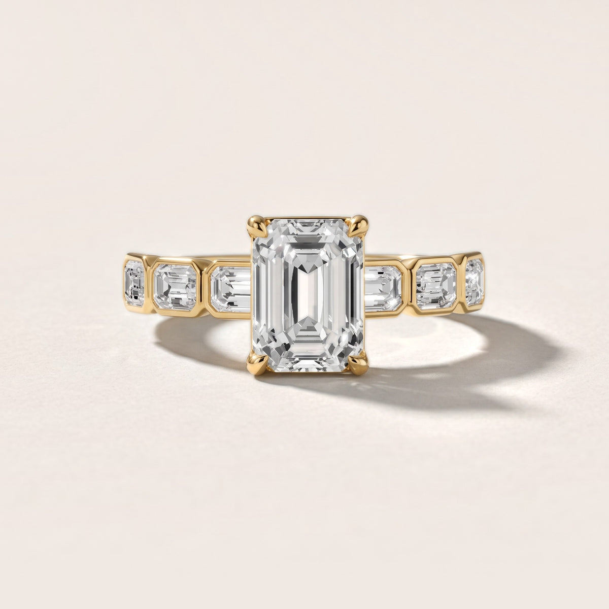Carol Half Bezel Emerald Diamond Engagement Ring in Yellow Gold - front.jpg