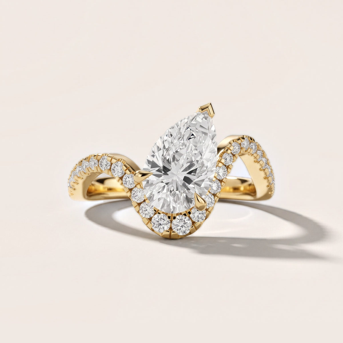 Cambria Bypass Pavé Pear Diamond Engagement Ring in Yellow Gold - front.jpg