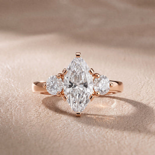 Freesia Three-Stone Marquise Diamond Engagement Ring in Rose Gold - front.jpg