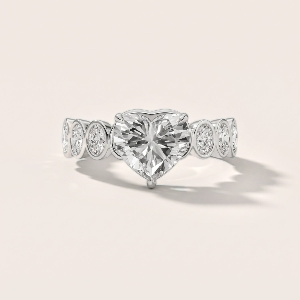 Vittoria Graduated Bezel Heart Diamond Engagement Ring in Silver - front.jpg