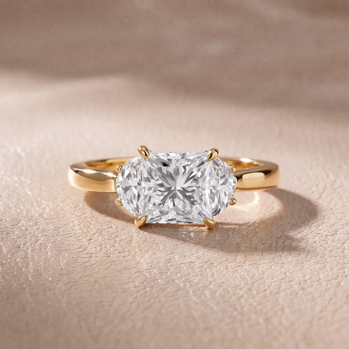Romy Three-Stone Princess Diamond Engagement Ring in Yellow Gold - front.jpg