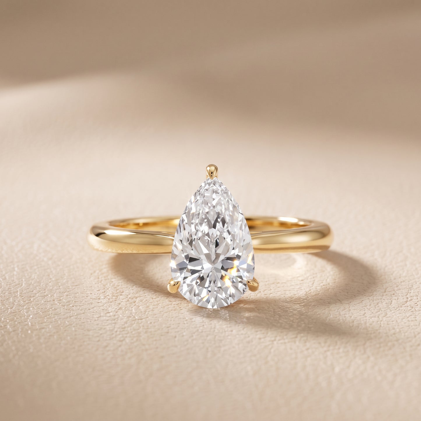 Kalia Knife Edge Solitaire Pear Diamond Engagement Ring in Yellow Gold - front.jpg