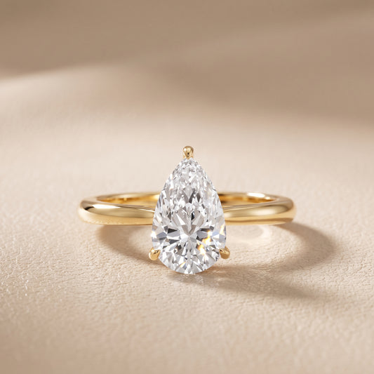Kalia Knife Edge Solitaire Pear Diamond Engagement Ring in Yellow Gold - front.jpg
