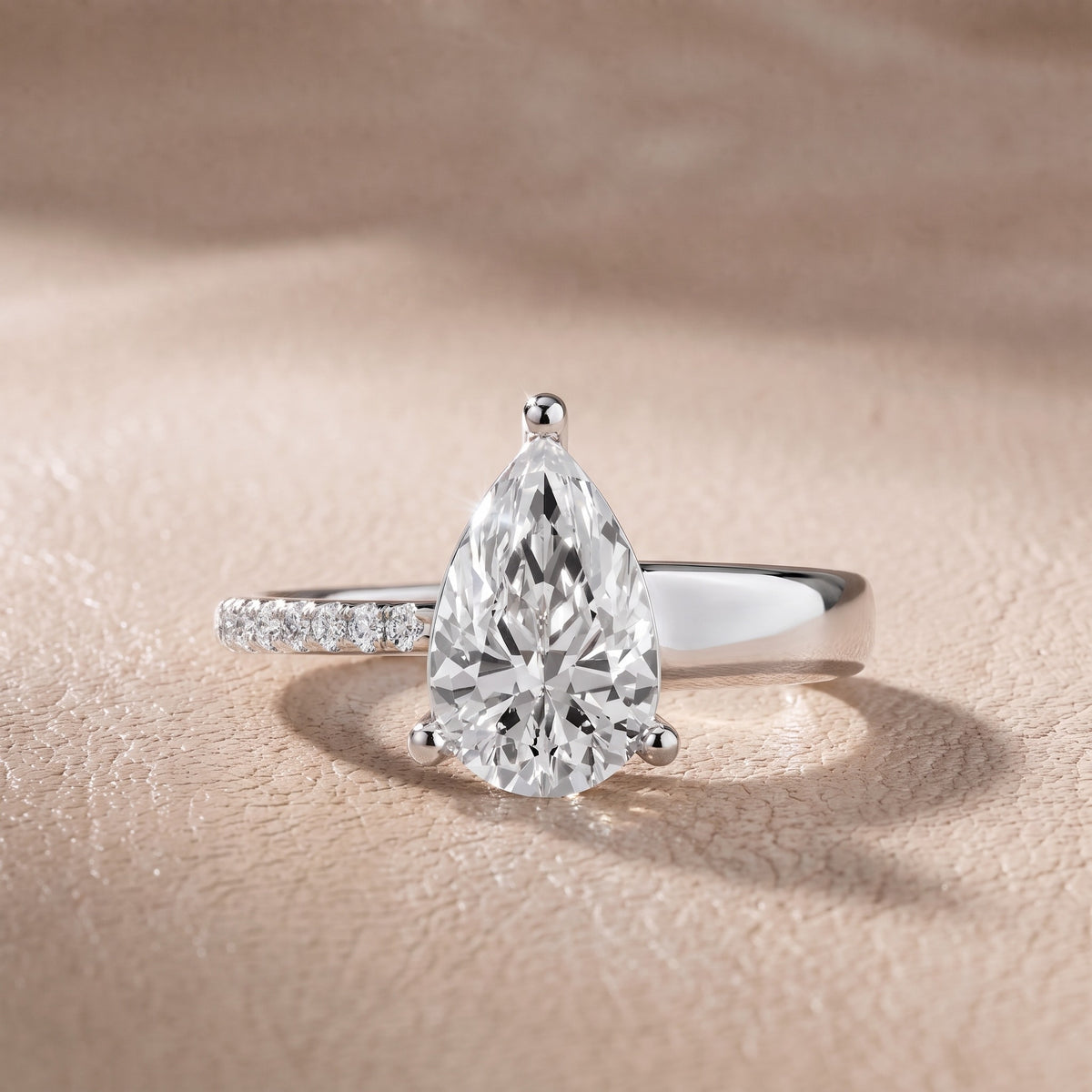 Rosie Solitaire Basket Pear Diamond Engagement Ring in White Gold - front.jpg