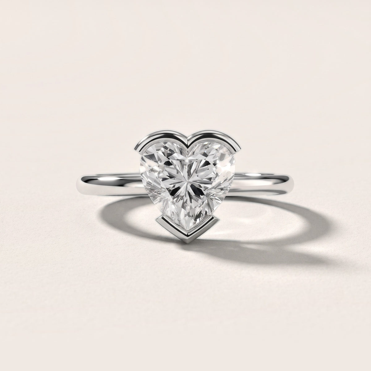 Bedford Half Bezel Solitaire Heart Diamond Engagement Ring in Silver - front.jpg