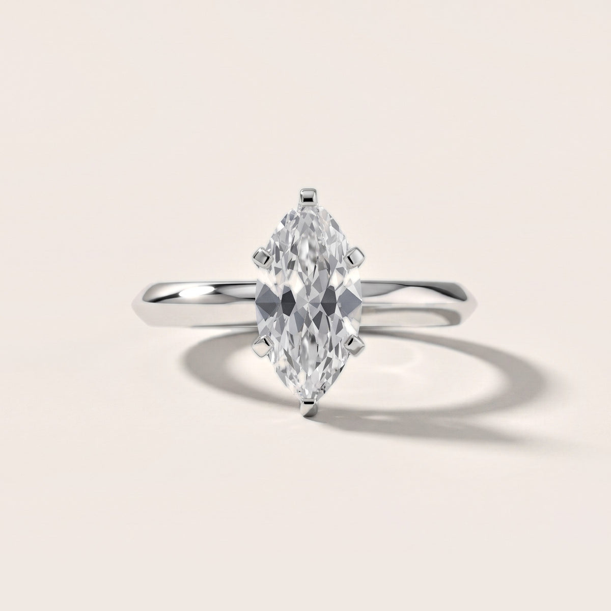Hailey Solitaire Knife Edge Marquise Diamond Engagement Ring in Platinum - front.jpg