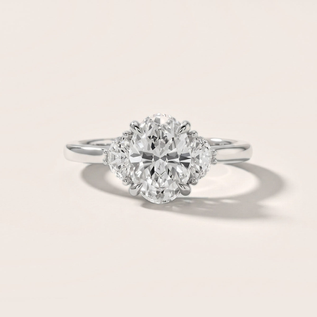 Geneva Half-Moon Three-Stone Oval Diamond Engagement Ring in White Gold - front.jpg