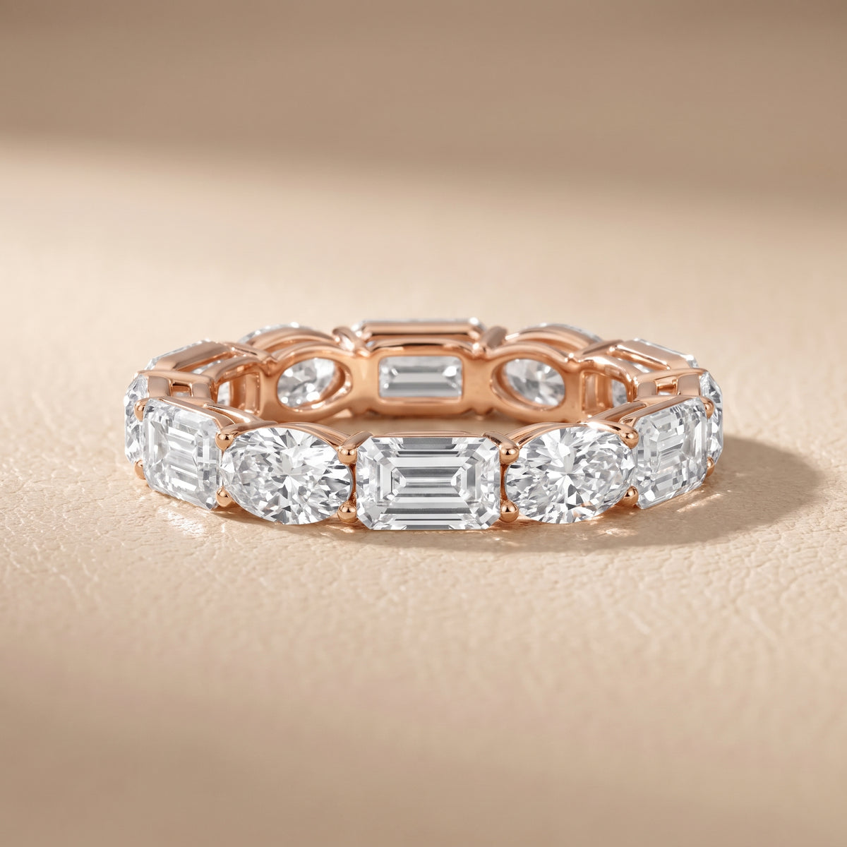 Avery Shared Prong Emerald & Oval Diamond Eternity Band in Rose Gold - front.jpg