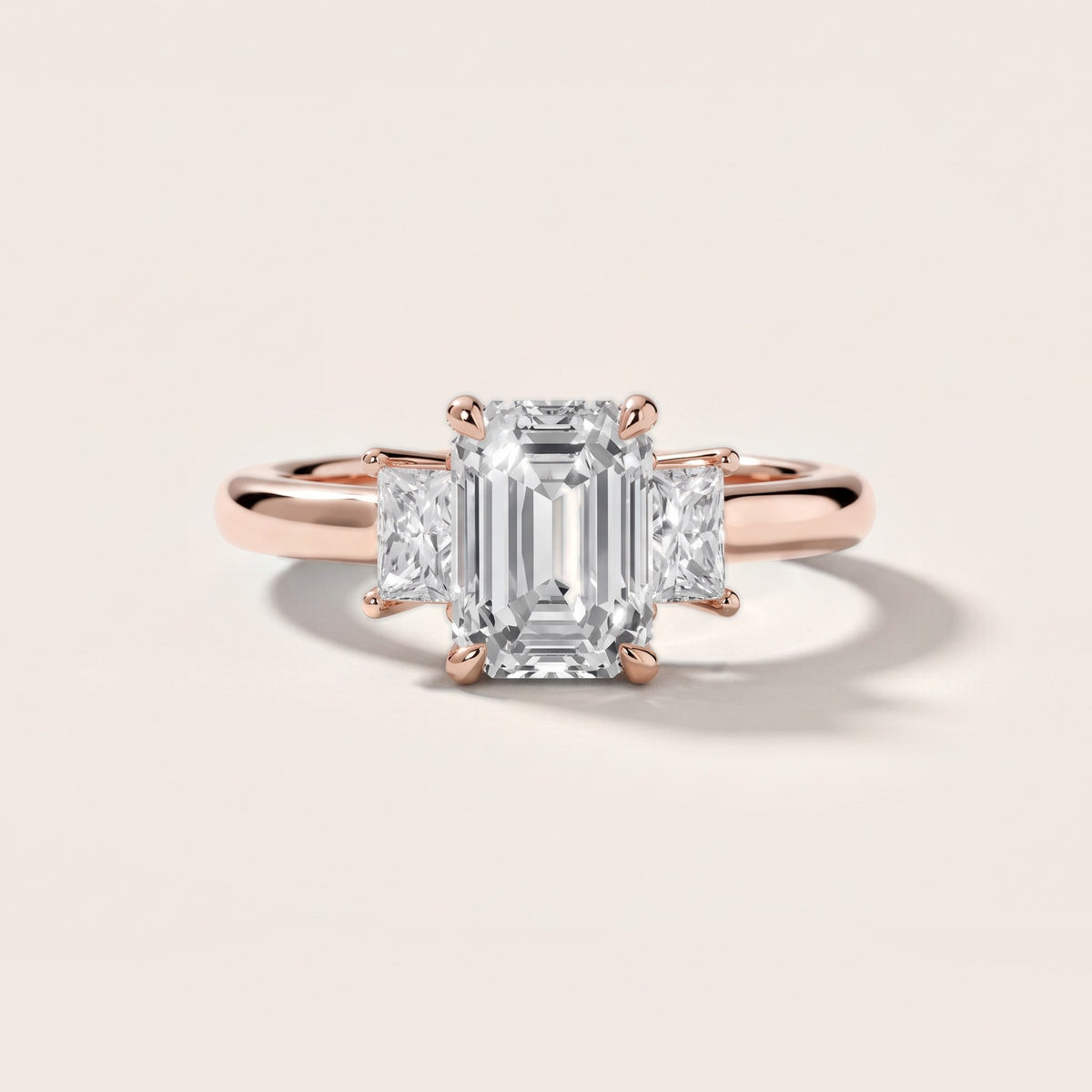 Cosette Statement Three-Stone Emerald Diamond Engagement Ring in Rose Gold - front.jpg