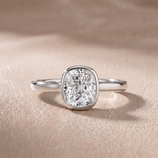 Carina Bezel Hidden Halo Cushion Diamond Engagement Ring in Platinum - front.jpg