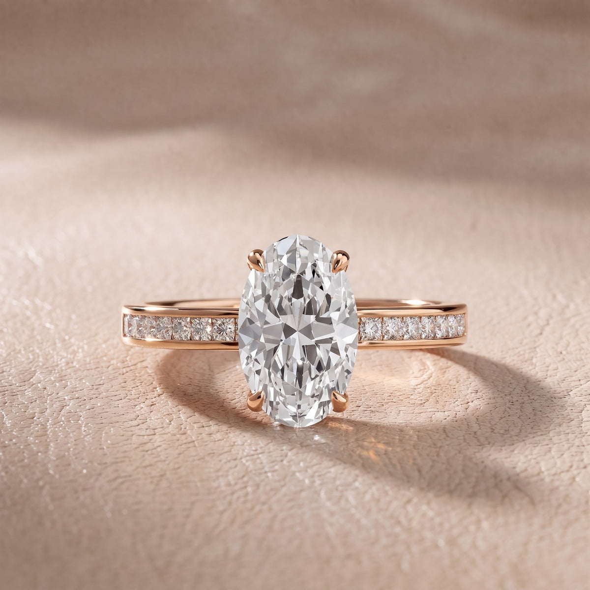 Maren Sidestone Channel Set Oval Diamond Engagement Ring in Rose Gold - front.jpg