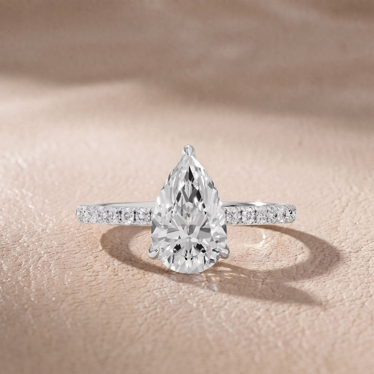 Olivia Solitaire Pavé Pear Diamond Engagement Ring in White Gold - front.jpg